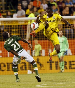 Columbus Crew midfielder Tony Tchani (6) kicks the ball away from Portland Timbers midfielder Diego Chara (21) in the first half of their game at Mapfre Stadium in Columbus, Ohio on September 26, 2015. (Columbus Dispatch photo by Brooke LaValley)